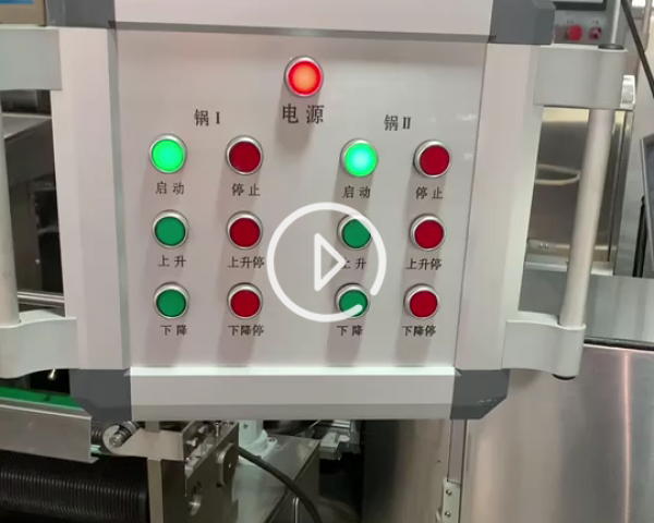 雙頭包衣機(jī)工作現(xiàn)場